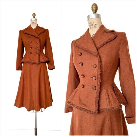 An Utterly Adorable Vintage Skirt Suit From The 1940s! Super Soft Wool Flannel In The Prettiest Shade Of Deep, Mottled Orange. Perfectly Fitted Double Breasted Jacket With Nipped In Waist And Peplum Detail. Wide Notched Collar And Turn Back Cuffs; Edges Trimmed In Brown Wool. Fully Lined. Beautiful Gored Skirt With Metal Side Zipper And Button Closure. Unlined. Labeled Utah Tailoring Mills, Ogden, Utah, Made Out Of 100% Virgin Wool From Forstmann So You Know It’s Good. Good Condition-There Are A Handful Of Moth Holes And A Couple Grazes Mostly On Jacket. Jacket 21” Long 34” Bust 26” Waist 15” Shoulder Seam To Seam 22” Sleeves Skirt 29” Long 24” Waist (Can Move Button To 1940s Winter Fashion, 40s Outfits, Forties Fashion, Vintage Skirt Suit, Lace Costume, Ogden Utah, Gored Skirt, Big Sleeves, Coat Women Fashion