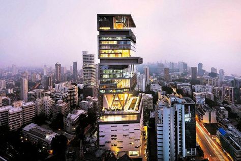 There are luxury homes, and then there’s Antilia—the Mumbai home of business magnate Mukesh Ambani, Chairman of Reliance Industries. Inspired by the mythical Atlantic island, Mukesh Ambani’s, located in South Mumbai’s Altamount Road is estimated to be the world’s second-most expensive property after the Buckingham Palace. The high-end mansion reportedly costs an estimated $1-2 billion. … Continue reading "The Most Expensive Home In The World: Antilia" Billion Dollar Homes, Orang India, Deck Skirting, Architecture Unique, John Lautner, Eco Friendly Building, Modern Mansion, Expensive Houses, Manhattan New York