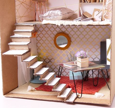 Making a dollhouse from reused materials? Build stairs out of a cardboard box Cardboard Box Dollhouse Diy, Houses Out Of Cardboard Boxes, Carton Crafts Cardboard, Cardboard Stairs Diy, Cardboard Box Dollhouse, Crafts To Do With Cardboard Boxes, Dollhouse Stairs Diy, Cardboard Dollhouse Diy Templates, Cardboard Stairs