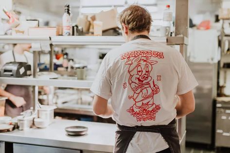 The Best London Restaurant Merch to Buy Right Now - Eater London Restaurant Merch, Waitress Outfit, Simple Streetwear, Coffee Shop Branding, London Restaurant, Cool Restaurant, London Restaurants, Graphic Tshirt Design, Coffee Shirts