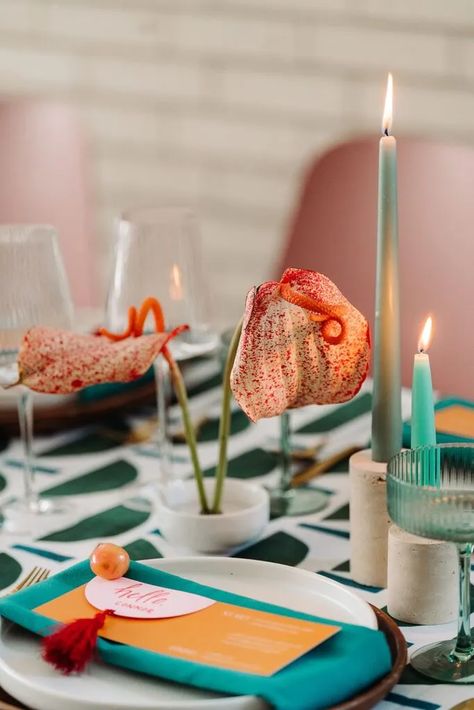 wedding tablescape florals are accented by ikebana frog florals of anthurium flowers. wedding table centerpiece Tablescape Florals, Floral Editorial, Flowers Wedding Table, Floral Frogs, Wes Anderson Inspired, Funky Wedding, Anthurium Flower, Wedding Tablescape, Wedding Set Up