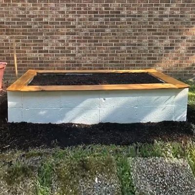 Cinder Block And Wood Raised Garden Bed, Concrete Block Flower Bed, Cement Block Raised Garden Beds, Painting Cinder Blocks, Cinder Block Raised Garden Bed, Cinder Block Raised Garden, Backyard Raised Garden Beds, Cinder Block Garden Bed, Brick Raised Beds