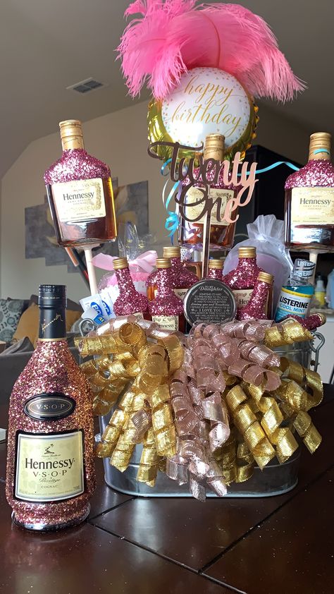 Daughters birthday bucket filled with everything needed to get the party bus started. BC powders, Advil, Listerine, flask,  21st wine cup, fluffy socks, personalized compact mirror, 10 bottles of Hennessey (various sizes), and one bottle of VSOP. Liquor Bottle Cake, Diy Alcohol Gifts, Birthday Cake Beer, Diy 21st Birthday Gifts, Birthday Checklist, Booze Gift, Beer Cakes, Alcohol Gift Baskets, 21st Birthday Checklist