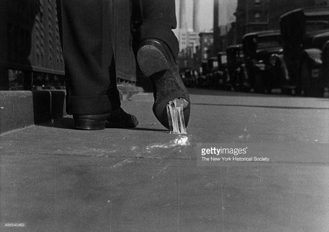 Close-up view of a man walking on a city sidewalk, with chewing gum stuck on the bottom of his shoe, New York, 1930. Gum On Shoe, City Sidewalk, Sketchbook Art, Chewing Gum, Up Shoes, Walk On, On Shoes, A Man, Gum