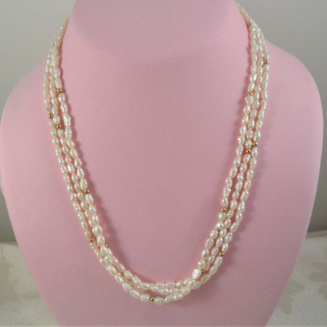 "Lovely necklace features multi strands of lustrous rice pearls that accented with small gold beads, and a 14K gold clasp. It measures 20\" Excellent condition" Victorian Jewelry Necklace, Rice Pearl Necklace, Small Pearl Necklace, Pearls Jewellery, Rice Pearls, Bridal Jewellery Design, Pearl Jewelry Design, Pearl Necklace Designs, Black Beaded Jewelry