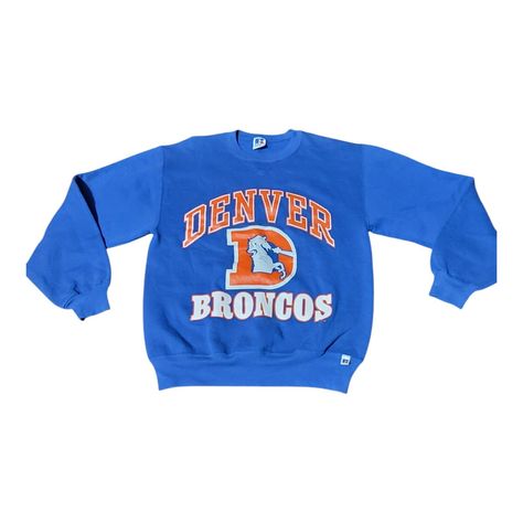 Show off your love for the Denver Broncos with this vintage 80s Russell Athletic crewneck sweatshirt. Made in the USA, this sweatshirt features a graphic print of the team's logo and colors in blue. The long sleeve sweatshirt is made of a comfortable blend of polyester, cotton, and cotton blend fleece fabric, making it perfect for any activity. It's a regular fit size medium and is machine washable for easy care. This pullover sweatshirt is a great addition to any activewear collection and is perfect for showing your team spirit. Get yours today and proudly wear it on game day! Classic Sportswear, Russell Athletic, Athletic Apparel, Denver Broncos, Long Sleeve Sweatshirts, Fleece Fabric, Pullover Sweatshirt, Pullover Styling, Crewneck Sweatshirt