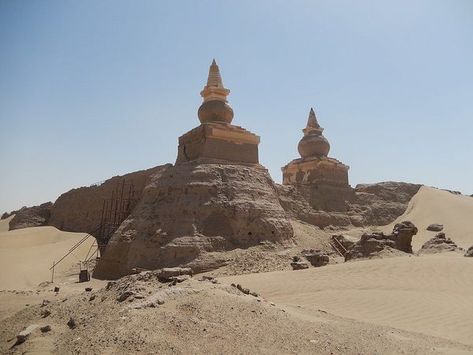 Sited in an Inner Mongolian desert are the remnants of an important trade stop along the Silk Road. Mongolian Desert, Wooden Pathway, Desert Nomad, Incredible Architecture, Visit China, The Silk Road, Hermitage Museum, Atlas Obscura, Silk Road