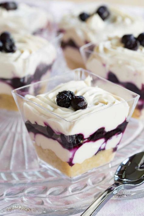 Blueberry Maple Mini Cheesecake Parfaits - an easy no-bake dessert recipe perfect for parties with a gluten free almond meal crust and @WymansofMaine frozen wild blueberries. #AD Gluten Free Easter, Best Summer Desserts, Cheesecake Parfaits, Parfait Desserts, Blueberry Desserts, Thanksgiving Food Desserts, Easy No Bake Desserts, Summer Dessert Recipes, Cheesecake Desserts