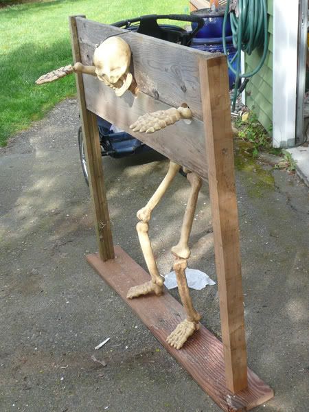 And here is my current prop stocks with the skeleton.  I need to build this one up a bit more and make it more sturdy with bracing, but you get the idea.All suggestions are welcome.  And if you have more photos of stocks, please post them. Cheap Halloween Diy, Diy Halloween Dekoration, Cheap Diy Halloween Decorations, Halloween Camping, Halloween Decorations Ideas, Halloween Diy Outdoor, Halloween Skeleton Decorations, Halloween Outside, Fairy Halloween Costumes