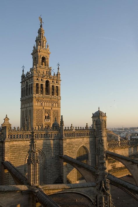 Seville Cathedral in Seville, Spain Seville Cathedral Spain, Seville Cathedral, Acropolis Of Athens, Dancing House, Moorish Architecture, Architecture Wall Art, Places In Spain, Dome Of The Rock, Gateway Arch