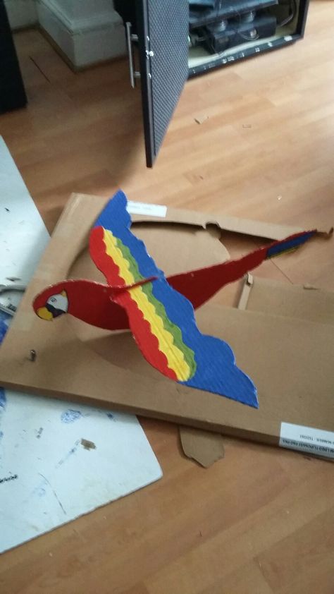 Cardboard parrot I made to hang from classroom ceiling x Hang From Ceiling, Classroom Ceiling, Parrot Craft, Jungle Theme Classroom, Carton Diy, Bird Template, Preschool Classroom Decor, Jungle Art, Hand Crafts For Kids