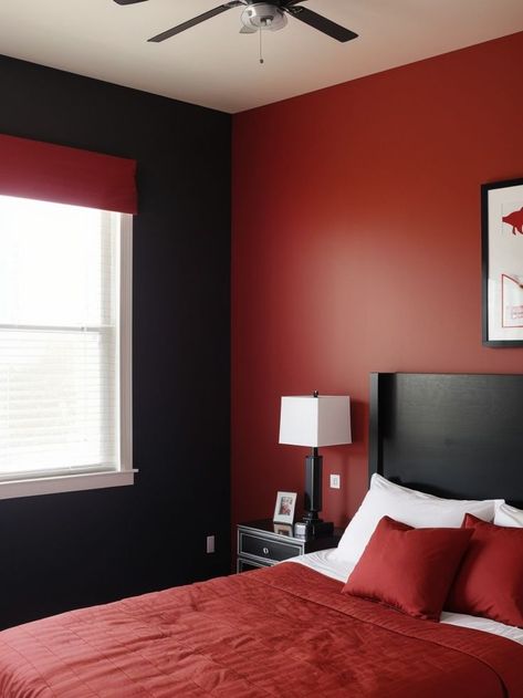 Create a bold statement in a boys bedroom with a vibrant red accent wall. Pair it with a sleek black bed frame and a sports-themed wall decal for an energetic and masculine vibe. Accent Walls Bedroom, Black Boy Room, Red Boys Bedroom, Red Accent Wall, Feature Wall Bedroom, Black Accent Walls, Black Bed Frame, Black Bed, Accent Wall Bedroom