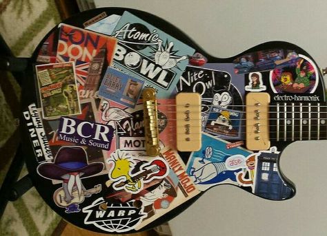 My 2015 Epi LP special, extensively modified. Stickers On Bass Guitar, Decorated Guitars Stickers, Electric Guitar With Stickers, Stickerbomb Guitar, Sticker Bombed Guitar, Guitar Case With Stickers, Sticker Bomb, Electric Guitar, Guitar