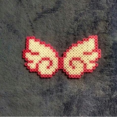 Pink angel wings Pink Angel Wings, Melt Beads, Melt Beads Patterns, Bead Keychain, Perler Ideas, Beads Patterns, Hamma Beads, Pink Angel, Beads Ideas