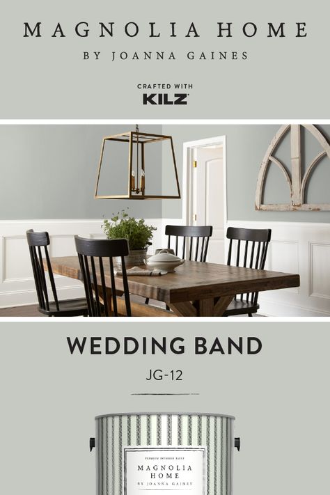 If you love traditional interior design, then Wedding Band—from the Magnolia Home by Joanna Gaines® Paint collection—could be the perfect wall color for you! This light shade of gray is a traditional neutral that pairs beautifully with white board and batten trim and dark wood furniture, as seen in this dining room. Click below for full color details to learn more. Magnolia Wedding Band Paint, Wedding Band Paint Color Joanna Gaines, Farmhouse Dining Room Paint Colors, Farmhouse Dining Room Paint, Farmhouse Hygge, Magnolia Dining Room, Magnolia Paint Colors, Jo Gaines, Magnolia Style