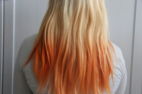 Blonde to orange ombre coloured hair Blonde To Peach Ombre Hair, Blonde With Orange Tips, Blonde To Orange Ombre, Blonde Hair With Orange Tips, Blonde Hair Orange Highlights, Blonde Hair Orange Tips, Blonde To Orange Hair, Blond And Orange Hair, Orange Dip Dye Hair