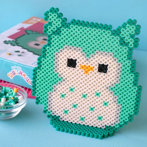 Buy the Perler™ Squishmallows™ Winston Fused Bead Kit at Michaels. Create Winston, the aspiring chef from the Squish Squad, with this fun fuse bead activity kit from Perler. Create Winston, the aspiring chef from the Squish Squad, with this fun fuse bead activity kit from Perler. Pattern sheet includes a design for a display stand so you can prop your finished creation. Not only are Perler bead sets a fun and engaging craft for kids, they're also a beneficial way to encourage and promote fine mo Perler Bead Book, Hama Beads Patterns Small, Large Perler Bead Patterns, Squishmallow Perler, Cute Perler Bead Patterns, Squish Squad, Perler Pattern, Embroidery Beading, Pattern Sheet