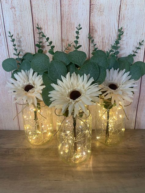 Simple Engagement Party Centerpieces, Engagement Centerpiece Ideas, Daisy Bridal Shower Ideas, Daisy Centerpiece Ideas, Farmhouse Bridal Shower Ideas, Gerba Daisy, Fairy Lights Wedding Centerpieces, Eucalyptus Wedding Table Decor, Eucalyptus Table Decor