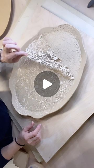 Pine Lake Pottery on Instagram: "Part 2 of the Lace Platter - this turned out great 🥳 and it’s huge! I used the 13x17 @gr.pottery.forms and a template I made in Part 1 on my cricut! 👀 A couple tips:  1. Centering a pattern under a template is tricky - I laid the lace and foam template down and then slid my template out to get it centered. 2. Leave the lace in until after you make the tray - it’ll keep the texture perfect. 3. Two foot rings to prevent sagging - a must! I might even do a third next time.  4. Weight on top during the drying process to prevent warping and don’t forget about a slow dry!  5. A thin layer of Alumina Hydrate on the kiln shelf to allow movement when it shrinks during the bisque fire.  #happypotting #handmade #laceplatter #kitchendecor #functionalpottery #cheesebo Hand Built Pottery Platters, Ceramic Tray Ideas, Slab Pottery Templates, Surface Decorations, Pottery Templates, Pottery Creations, Pottery Molds, Pottery Tray, Bisque Pottery