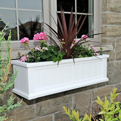 This window box features a double-wall design creating a water reservoir. Color: White | Lark Manor™ Bilmont Plastic Window Box Planter Plastic in White, Size 11.0 H x 36.0 W x 11.0 D in | Wayfair Window Flower Boxes, White Window Boxes, Fall Clean Up, Plastic Planter Boxes, Plant Window, Window Box Flowers, Window Planters, Decorative Brackets, White Window