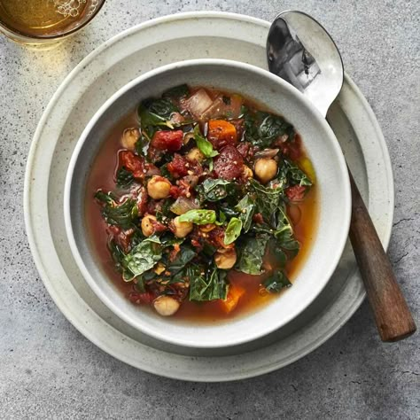 With a focus on vegetables, fiber-rich legumes and healthy fats, this slow-cooker stew fits the bill for those following the Mediterranean diet. Swap out the chickpeas for white beans for a different twist, or try collards or spinach in place of the kale. A drizzle of olive oil to finish pulls together the flavors of this easy vegan crock-pot stew. Mediterranean Diet Stew, Mediterranean Chicken Stew, Mediterranean Stew, Slow Cooker Mediterranean, Slow Cooker Stew, Easy Mediterranean Diet Recipes, Mediterranean Chicken, Vegan Soup Recipes, Chowder Recipes