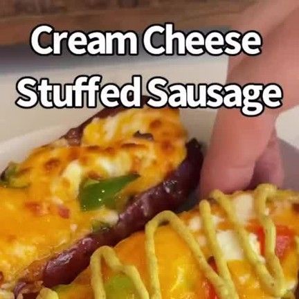 Keto Recipes on Instagram: "Say “YES” if you would eat this Cream Cheese Stuffed Sausage 😋🙌 Credit: @ketosnackz Ingredients: 4 fully cooked sausage links 1/2 block cream cheese 1 cup shredded cheddar 1/2 cup chopped peppers & onions Instructions: 1. Slice your sausages down the middle. 2. Mix the rest of your ingredients but only use half of your cheddar. 3. Add to a parchment lined baking sheet and top with the rest of your cheddar. 4. Air fry at 400F for 5-10 minutes. 5. Take out, let cool & Keto Smoked Sausage Recipes, Cream Cheese Stuffed Sausage, Cheese Stuffed Sausage, Stuffed Sausage, Sausage Bake, Sausage Links, Carnivore Diet, Keto Challenge, 2 Block