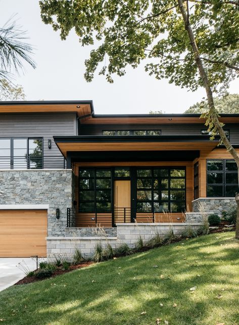 Modern Home Architecture Black Windows Cedar and Walnut Accents Dark Gray Siding in Sherwin Williams Urbane Bronze Modern Home Architecture Modern Home Architecture Black Windows Cedar and Walnut Accents Dark Gray Siding in Sherwin Williams Urbane Bronze Modern Home Architecture Modern Home Architecture Black Windows Cedar and Walnut Accents Dark Gray Siding in Sherwin Williams Urbane Bronze #ModernHome #Architecture #BlackWindows #Cedar #Walnut #Accents #DarkGraySiding #GraySiding #SherwinWilli Modern Lake House Exterior, Modern Home Trends, Exterior Inspiration, Home Bunch, Home Exterior Makeover, Cedar Homes, Backyard Remodel, Exterior Makeover, Exterior Stone