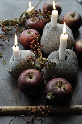 People think taper candles are just for churches or fancy dinner parties, get creative and find uses for tapers everywhere. Pagan Holidays, Stone Candle Holder, Rock Candle, Samhain Halloween, Decoration Shabby, Stone Candles, Hag Stones, Deco Nature, Deco Floral