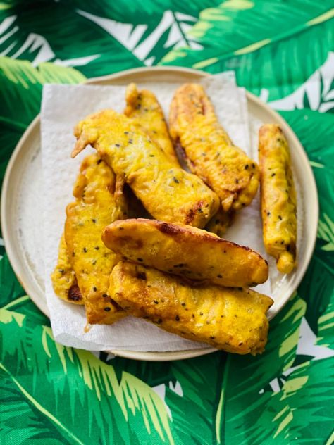 One of my all-time, favorite South Indian snacks is ethakka appam. It's the perfect tea-time snack. South Indian Snacks, Banana Fritters, Ripe Plantain, Black Sesame Seeds, Tea Time Snacks, Indian Snacks, Black Sesame, Pancake Batter, Hot Oil