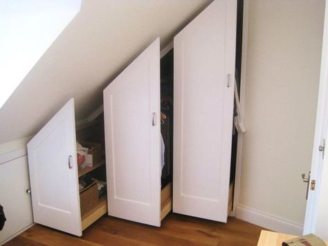 Attractive storage solution for under roof peak: have a gliding ladder that can allow access to area. Pull Out Wardrobe, Under Eaves Storage, Attic Storage Solutions, Minimalist Eclectic, تحت الدرج, Attic Bedroom Storage, Eaves Storage, Attic Wardrobe, Attic Bedroom Designs