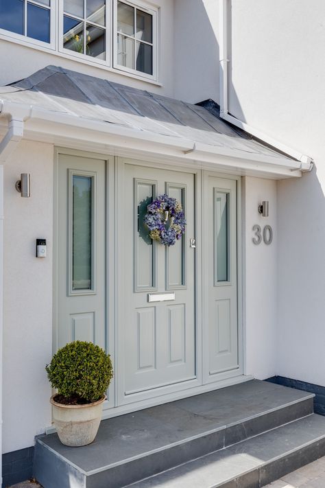 Your front door says a lot about who you are. This door belongs to open, light and busy family.. can you tell? See more of their beautiful home we finished designing last year.    #interiordesign #design #interior #homedecor #architecture #home #decor #interiors #homedesign #furniture #interiordesigner #decoration #luxury #designer #inspiration #homesweethome #interiorstyling #interiordecor #frontdoor Front Door On White House, Bright Front Door Colors, Front House Ideas, Bungalow Front Door, Bright Front Doors, Front Extension, Door Colors, Driveway Design, Architecture Home