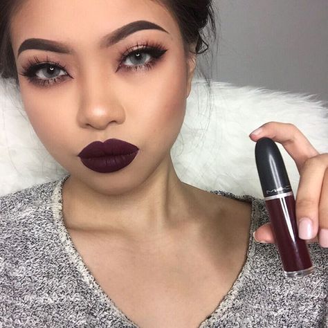 Dark maroon lipstick