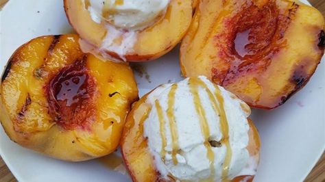 Grilled Peaches and Ice Cream Recipe - Allrecipes.com Peaches And Ice Cream, Grill Vegetables In Foil, Campfire Desserts, 5 Ingredient Dinners, Peach Ice Cream, Peach Desserts, Vanilla Bean Ice Cream, Summer Appetizer, Grilled Peaches