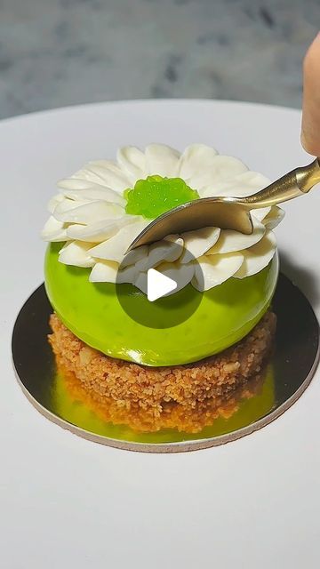 Elena Corobca on Instagram: "NEW RECIPE “ 🍹Mojito vibes, cheesecake dreams 😍”

Would you like a cake or a drink?🤩

WHIPPED GANACHE:
225 g cream 35%
25 g Glucose
25 g Inverted sugar
305 g white chocolate 35%
580 g cream 35%
Heat the smaller portion of cream, the glucose and the inverted sugar.
Gradually pour the hot mixture over the partially melted chocolate.
Using a hand blender, mix to make a perfect emulsion.
Add the larger portion of cold liquid cream.
Blend again.
Leave to set in the refrigerator for 12 hours.
Whisk until the texture is consistent enough to use in a piping bag or with a spatula.

*** NOTE: for a tastier ganache, add vanilla

#recipe #pastry #pastryrecipe #vanilla #chocolate #whitechocolate #recipeoftheday #mojito #mint #lemon #lime #cheesecake #spherification #past Lemon Lime Cheesecake, Buffet Dessert, Whipped Ganache, Lime Cheesecake, Piping Bag, Small Desserts, Melted Chocolate, Vanilla Chocolate, Hand Blender