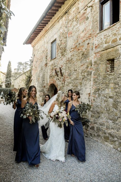 Breathtaking Black Tie Tuscany Wedding at Borgo di Castelvecchio | Junebug Weddings Elegant Wedding Bridesmaids, Tuscan Wedding Bridesmaids, Black Tie Wedding Color Schemes, Wedding Veils With Hair Down, Winter Bridesmaid, Wedding In Tuscany, 2025 Wedding, Lights Wedding, Bella Bridesmaid