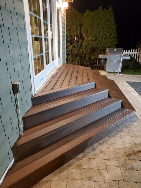 Steps From Deck To Yard, Deck With 2 Doors, Stairs To Deck Ideas, Wood Stairs On Concrete Patio, Concrete Patio With Stairs From House, Backyard With Stairs, Steps To Backyard Patio, Back Patio Stairs Ideas, Steps With Landing Outdoor