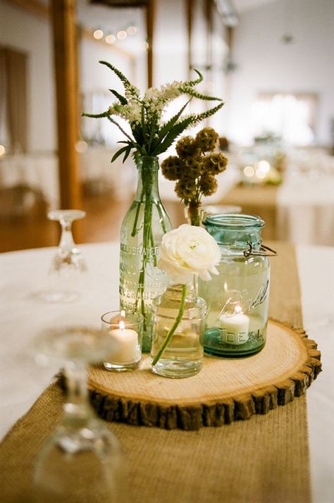 country mason jars wedding centerpiece / http://www.himisspuff.com/rustic-mason-jar-wedding-ideas/3/ Wedding Jars, Burlap Mason Jars, Flowers And Candles, Rustic Mason Jars, Flower Arrangements Simple, Mason Jar Wedding, Rustic Centerpieces, Mason Jar Centerpieces, Rustic Wedding Centerpieces