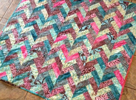 The Batik Braid Quilt Tutorial Quilt Jelly Roll, Braid Quilts, Strip Quilt Patterns, Braid Quilt, Herringbone Quilt, Jelly Roll Patterns, Colorful Quilt, Jelly Roll Quilt Patterns, Batik Quilts