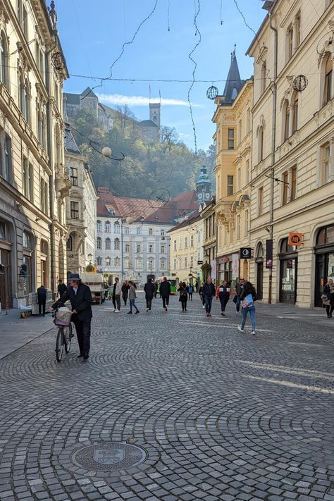 Looking up to Ljubljana Castle, Old Town Ljubljana, Slovenia. To take a day trip you'll remember forever and for more Travel Inspo, check out Wonder & Sundry! Ljubljana Slovenia Aesthetic, Ljubljana Aesthetic, Slovenia Aesthetic, Inter Railing, Ljubljana Castle, Europe 2024, Slovenia Travel, Ljubljana Slovenia, Lake Bled