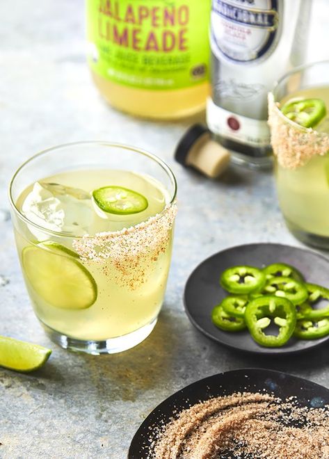 No bartending skills needed to make this amazingly easy margarita with a kick! | Trader Joe's Jalapeno Limeade is the secret ingredient to a crazy good cocktail! | Easy Jalapeno Margarita | Mexican Cocktails | Mexican Cocktails for a Crowd | Easy Holiday Cocktails | Cocktails for a crowd | Summer Cocktails | Tequila Cocktails #margarita #freakingdelish Trader Joe’s Spicy Limeade Margarita, Easy Jalapeno Margarita Recipe, Spicy Maggie, Jalapeño Limeade, Limeade Margarita, Cocktails For A Crowd, Cocktails Margarita, Cocktails Tequila, Easy Holiday Cocktails