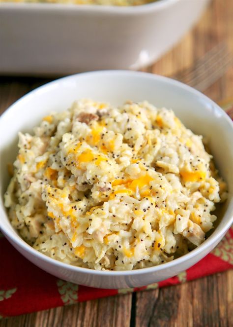 Chicken Poppy Seed Rice Bake - chicken, cheddar, sour cream, chicken soup, poppy seeds and rice - quick and easy weeknight casserole! Use rotisserie chicken and this comes together in 5 minutes! SO good! On the table in under 30 minutes! We make this at least once a week!! Cream Chicken Soup, Easy Weeknight Casseroles, Poppyseed Chicken, Plain Chicken Recipe, Poppy Seed Chicken Casserole, Chicken Rice Bake, Weeknight Casseroles, Chicken Cheddar, Poppy Seed Chicken