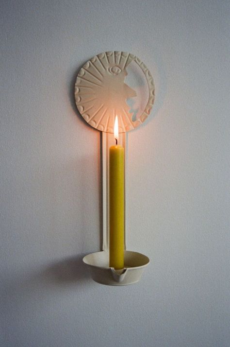 Slow Design: Soulful Handmade Goods from Dora Daar - Remodelista Wall Candle, Slow Design, Light And Darkness, The Sun And The Moon, Sun And The Moon, Greek Design, Keramik Design, Wall Candle Holders, Hand Painted Plates