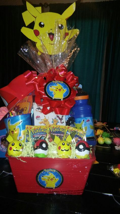 Pokemon easter basket Video Game Easter Basket Ideas, Pokemon Basket Ideas, Pokemon Easter Basket Ideas, Pokemon Gift Basket, Pokemon Easter Basket, Turkey Bingo, Pokemon Easter, Auction Basket, Easter Basket Ideas