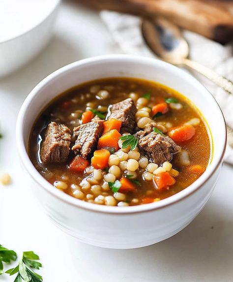 Hearty Beef Barley Soup packed with tender beef, vegetables, and barley. Perfect comforting meal for a cold day. Ready in under 2 hours. Beef And Barley Soup, Barley Soup Recipe, Beef And Barley, Barley Recipe, Beef Barley, Beef Barley Soup, Flavorful Vegetables, Vegetable Beef Soup, Beef Stew Meat