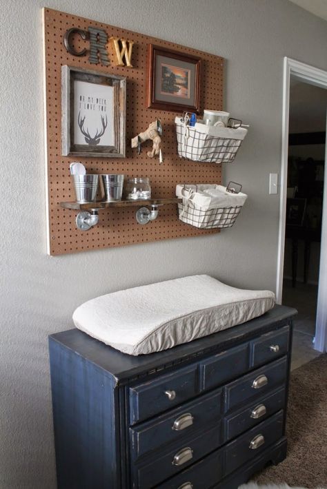 Love the use of a pegboard over the changing table to hold diaper supplies in this rustic hunting and fishing-themed nursery! Fishing Nursery, Boy Nursery Themes, Changing Tables, Themed Rooms, Baby Nursery Themes, Project Nursery, Baby Time, Nursery Inspiration, Everything Baby