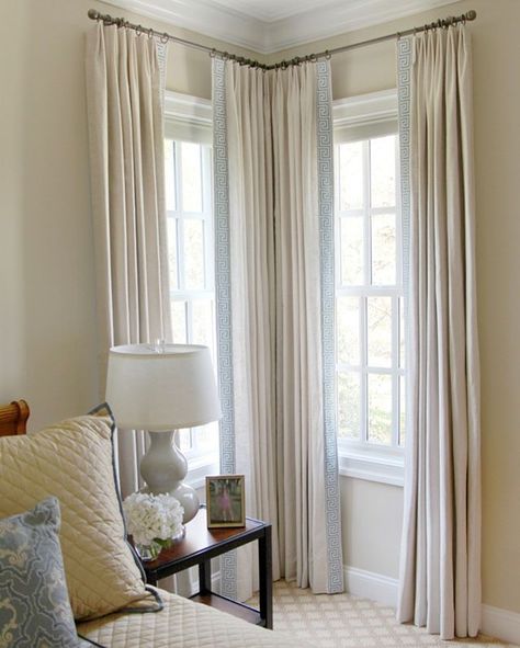 Unsure how to hang curtains on a tricky corner? That's where we come in! The smart window treatments in this Baltimore bedroom were designed by Kellogg Collection designer Diane Litz and finished with a beautiful blue banded trim. . . . . #baltimoremd #baltimore #windowtreatments #windows #classic #homedecor #room #home #roomgoals #lovely #decorate #decor #design #fabric #quality #designer #furniture #homeaccessories #hgtv #houzz Corner Window Curtains, Corner Window Treatments, Corner Curtains, Bedroom Drapes, Window Treatments Living Room, Window Treatments Bedroom, Corner Window, Fabric Curtain, Custom Made Curtains