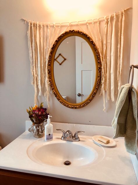 We hated how plain it was in the bathroom. So we found a theift store mirror and made some lace garland to hang behind it! Mirror Garland, Lace Garland, Store Mirror, Chic Bathrooms, Granny Chic, Diy Mirror, Oval Mirror, The Bathroom, Round Mirror Bathroom