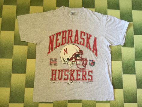 Excited to share the latest addition to my #etsy shop: Vintage 1995 FedEx Orange Bowl Nebraska Cornhuskers T-Shirt NCAA Football Tee Shirt Made in USA https://etsy.me/2XdCwfv #gray #athletic #shortsleeve #crew #footballjacket #nfljacket #starterjacket #hockeyjersey College Team Shirts, North Face Windbreaker, Football Graphic Tee, Orange Bowl, Football Jackets, Football Tee, Shirt Design Inspiration, Nebraska Cornhuskers, Team Shirt