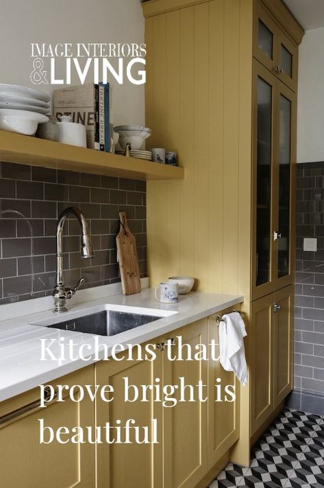 Thinking of painting your units? Here is some colourful kitchen inspiration that will convince you to crack out the paint brushes. #colourfulkitchen #yellowkitchen Howdens Kitchen Colours, Two Colour Kitchen Units, North Facing Kitchen, Colourful Kitchen Ideas, London Kitchen Design, Warm Kitchen Colors, Colourful Kitchens, Kitchen Cupboard Colours, Coloured Kitchen