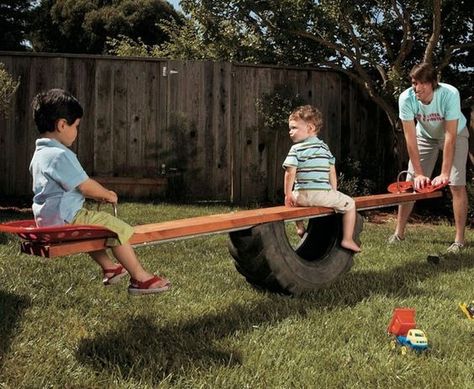 See Saw made using 1/2 a tire and tractor seats..We have plenty of tires and one tractor seat. Tire Chair, Reuse Old Tires, See Saw, Play Structures, Tractor Seats, Tractor Tire, Diy Playground, Play Ground, Old Tractor